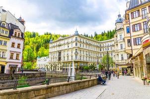 Karlovy Vary, Czech Republic, May 10, 2019 Carlsbad historical city centre with Tepla river central embankment photo