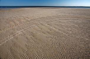 Sand flats along shore of Lake Winnipeg photo