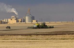 Farming seeding and Potash Industry in Background photo