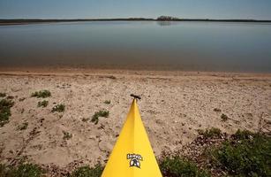 Kayak on beach at Lake Winnipeg photo