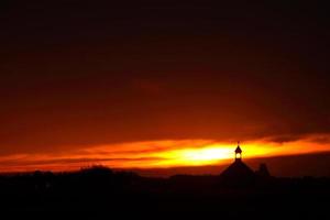 Sunrise behind Saint Columba Church in Saskatchewan photo