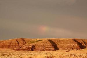 Partial rainbow over Big Muddy Valley of Saskatchewan photo