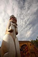 Totem pole outside native lodge at Kitsumkalum Provincial Park photo