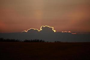 Sunlit cloud near sunset photo