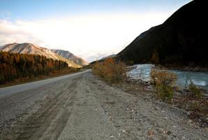 Creek flowing beside British Columbia highway photo