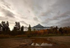 Reflection in puddle of British Columbia mountain photo