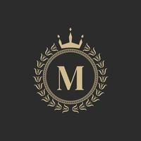 Initial Letter M Heraldic Royal Frame with Crown and Laurel Wreath. Simple Classic Emblem. Round Composition. Graphics Style. Art Elements for Logo Design Vector Illustration