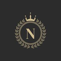 Initial Letter N Heraldic Royal Frame with Crown and Laurel Wreath. Simple Classic Emblem. Round Composition. Graphics Style. Art Elements for Logo Design Vector Illustration