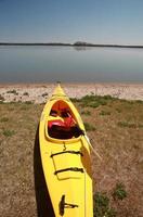 Kayak on beach at Lake Winnipeg photo