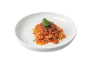 Spaghetti bolognese on a white plate photo
