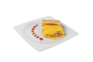 Focaccia Ham and Cheese put on a white plate photo