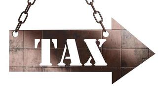 tax word on metal pointer photo