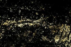 fondo grunge oscuro de textura dorada. abstracto para papel tapiz o diseño. foto