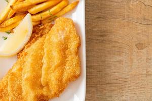 fish and chips - fried fish fillet with potatoes chips photo