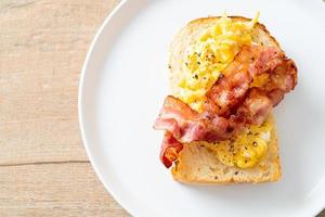 bread toast with scramble egg and bacon photo