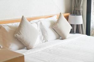 beautiful and comfortable pillows decoration on bed photo