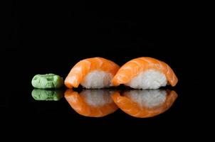 sushi on black background photo