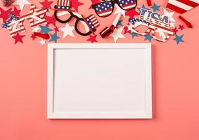 USA independence day party elements top view flat lay on pink with frame for mockup photo