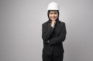 Engineer muslim woman wearing hijab on white background