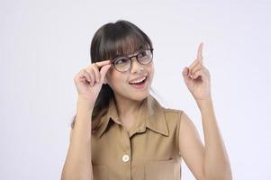 Beautiful woman wearing glasses over white background studio photo