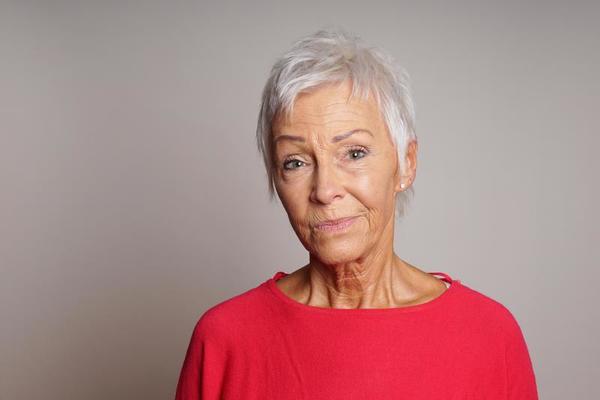 mature woman with skeptical look on her face 6240462 Stock Photo at Vecteezy
