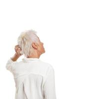 puzzled older woman scratching her head photo