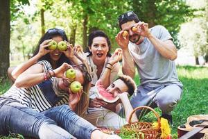 Happy friends having fun outside in nature photo