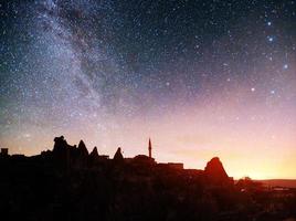Review unique geological formations in Cappadocia, Picturesque starry sky in Goreme National Park photo