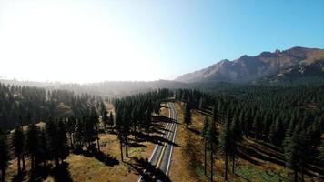 Natural Aerial view on the road and forest at the autumn time photo
