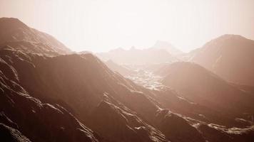 View of misty fog mountains in autumn photo