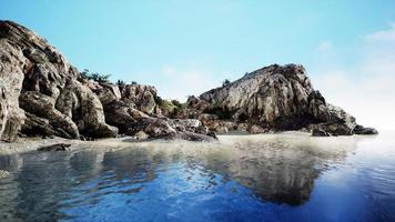 Summer view of sea caves and rock cliffs photo