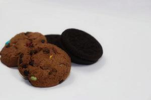 two kinds of chocolate-flavored dry bread on a gray background photo