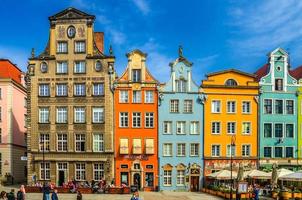 Facade of beautiful typical colorful houses buildings on Dluga Long Market street Dlugi targ square in Wroclaw photo
