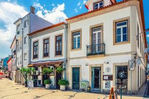 typical colorful buildings in Aveiro city historical centre in sunny summer day photo