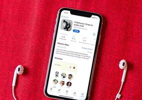 Clubhouse drop-in audio chat application view on smartphone screen photo