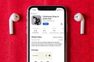 Clubhouse drop-in audio chat application view on smartphone screen photo