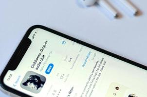 Clubhouse drop-in audio chat application view on smartphone screen photo
