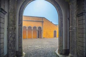 cobblestone courtyard of Pena Palace with arches and columns, Palacio Nacional da Pena Romanticist castle photo