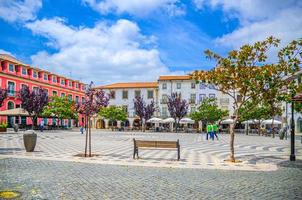 Praca Rodrigues Lobo square with typical traditional buildings and houses in Leiria city historical centre photo