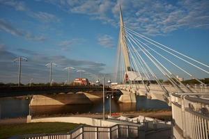 Unique walkway bridge over the Red River in Winnipeg photo