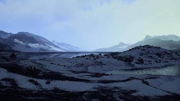 Winter landscape with snow covered rocks at Arctic Ocean video