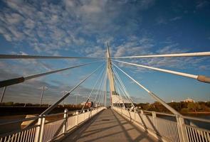 Unique walkway bridge over the Red River in Winnipeg photo