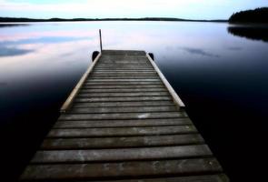 Boat dock at Smallfish Lake in scenic Saskatchewan photo