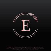 elegante logotipo floral circular con letra e con línea de rama de monograma de hoja elegante creativa y color negro rosa. utilizable para logotipos de negocios, moda, cosméticos, spa, ciencia, medicina y naturaleza. vector
