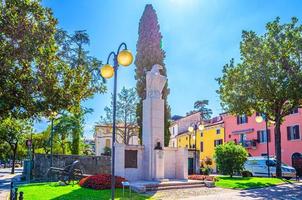 Desenzano del Garda, Italy, September 11, 2019 Achille Papa eagle monument and cannon photo