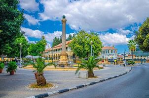 Sarayonu Ataturk Square with Venetian Column Obelisk and Mahkemeler Binas Law Courts building photo