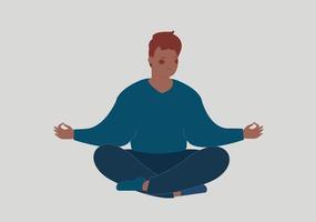 Black man meditates on the floor with closed eyes. Male or Adolescent sits with cross-legged and practices yoga. Breathing exercises in the morning. Inner peace, health care and positive body concept.