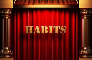 habits golden word on red curtain photo