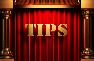 tips golden word on red curtain photo