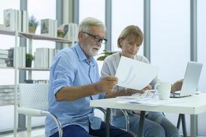 Caucasian senior Business people working and brainstorming in modern office photo